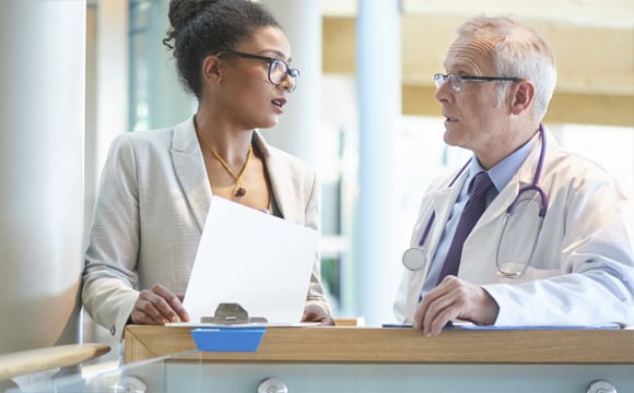 Doctors having discussion in hospital