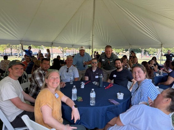 Lodestar at outdoor company party under canopy